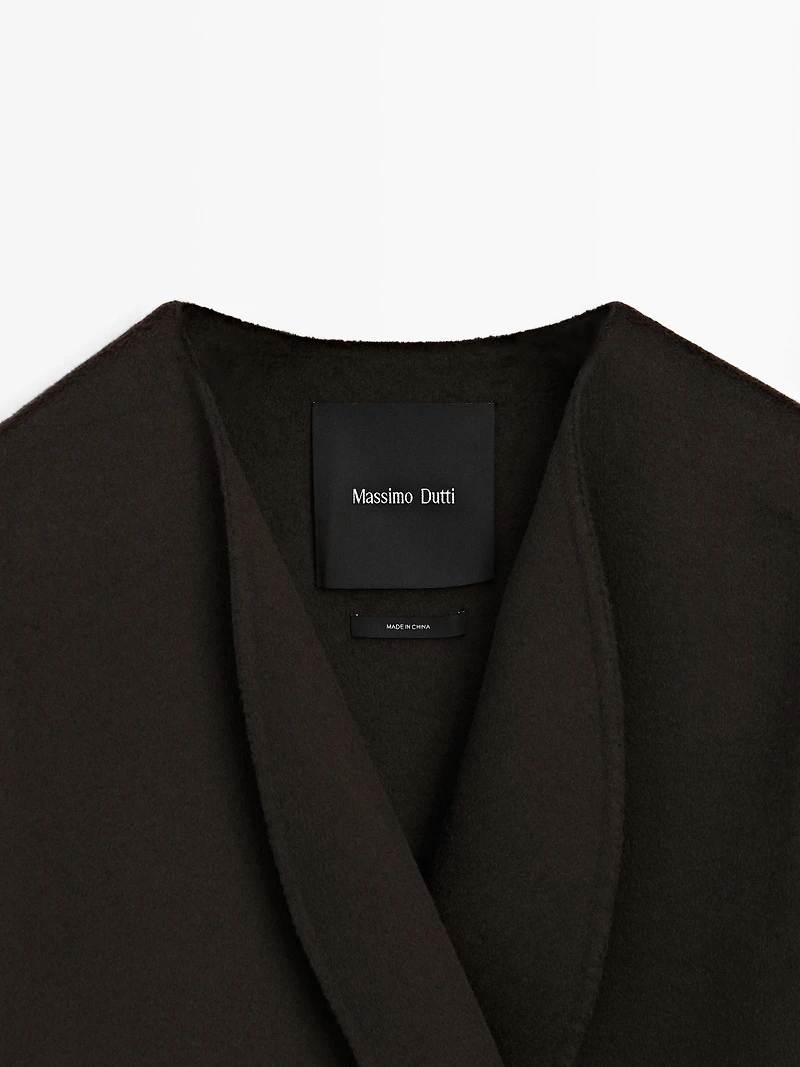 Short coat with rounded lapels