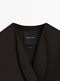 Short coat with rounded lapels