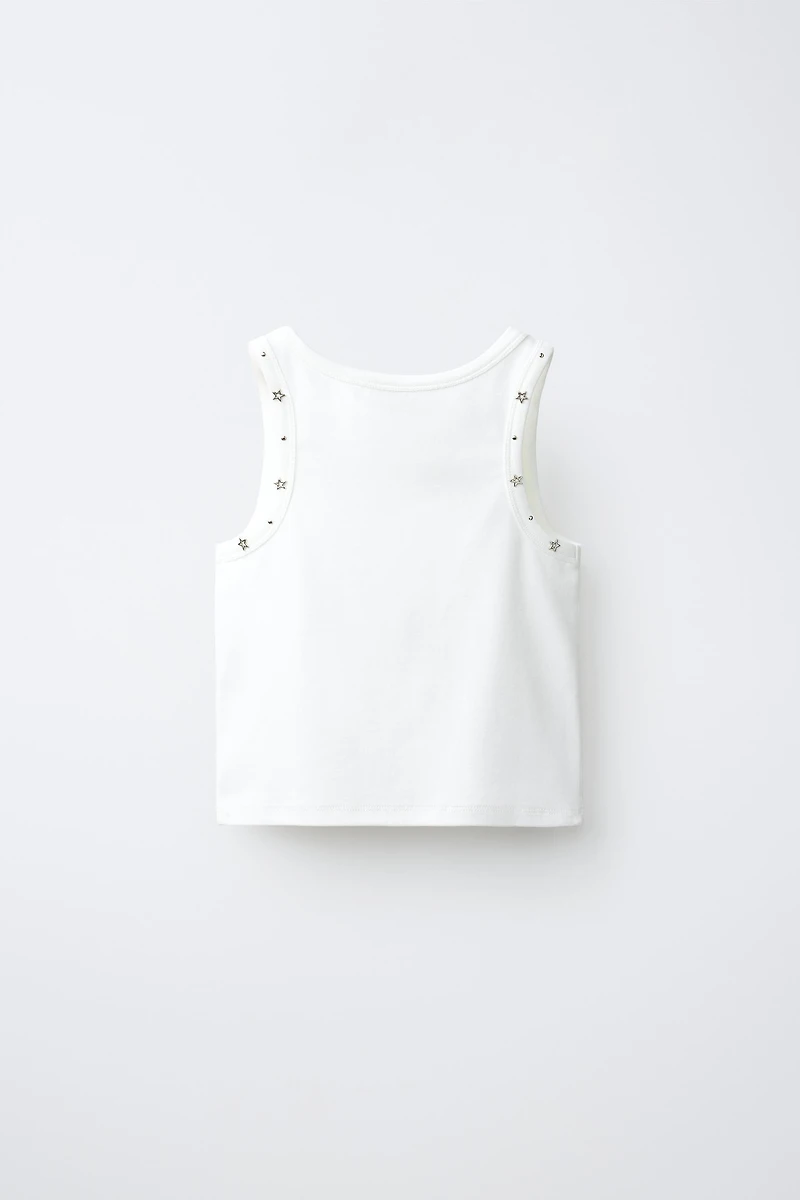T-SHIRT À CLOUS ET ÉTOILES