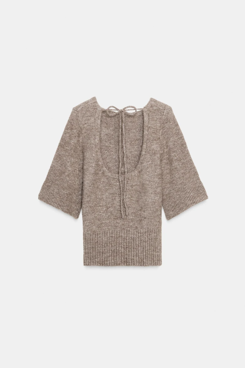TOP EN MAILLE DOS NU