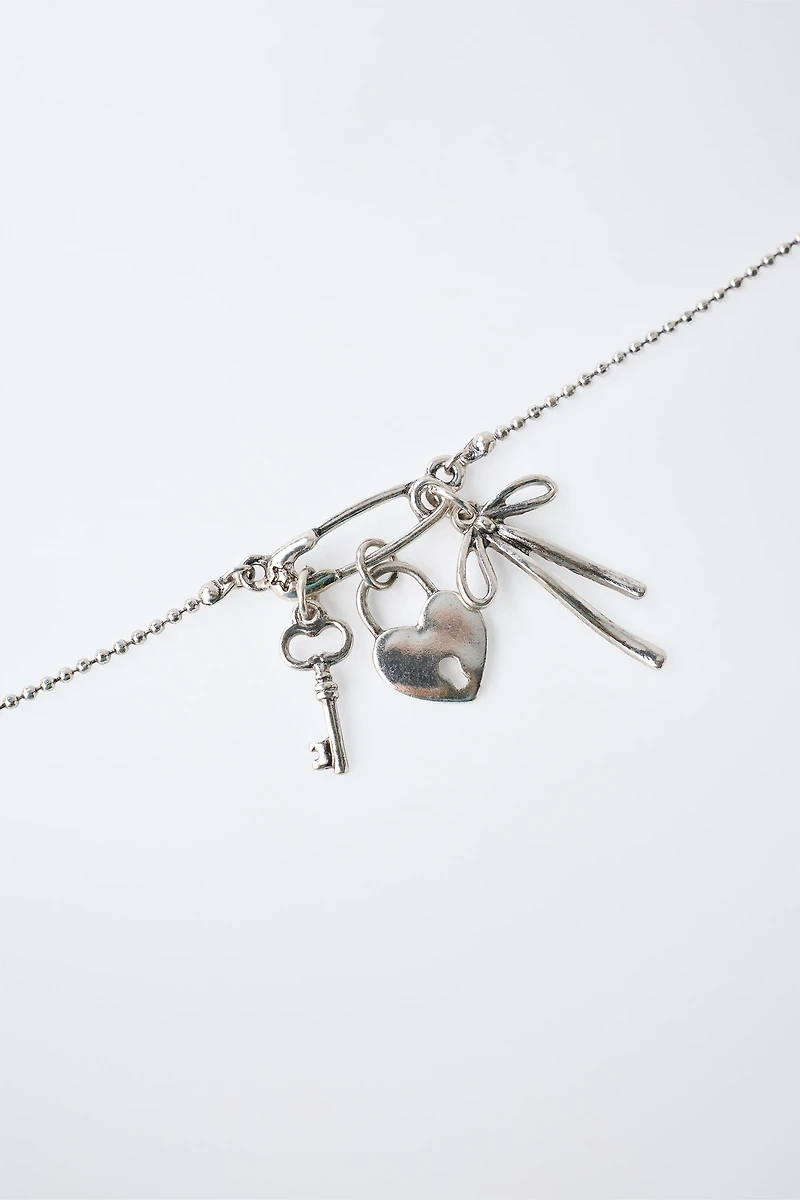 COLLIER PENDENTIFS CLÉ, NŒUD ET CADENAS