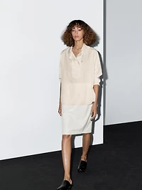 Flowing blouse with button detail