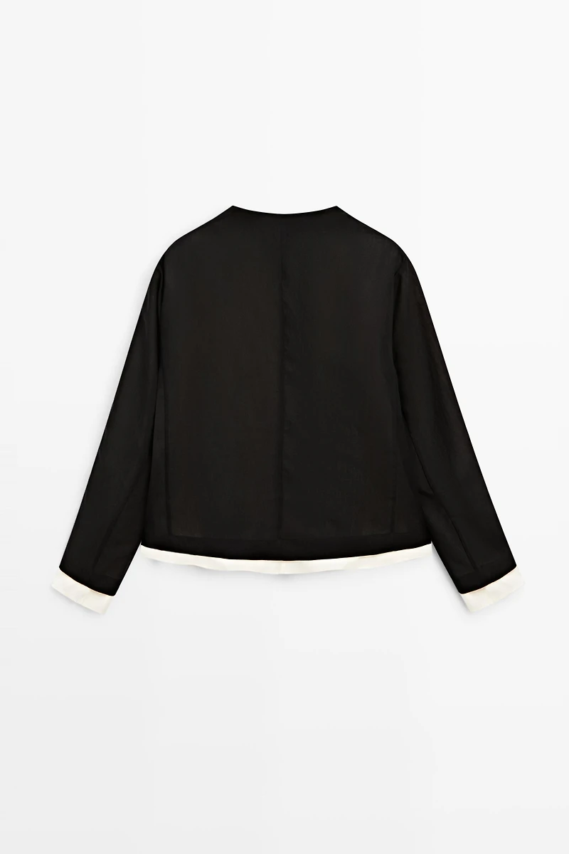 Veste double contraste total look