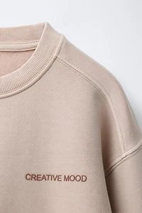 WASHED EFFECT TEXT SWEATSHIRT