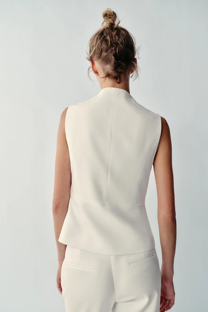 PEPLUM VEST
