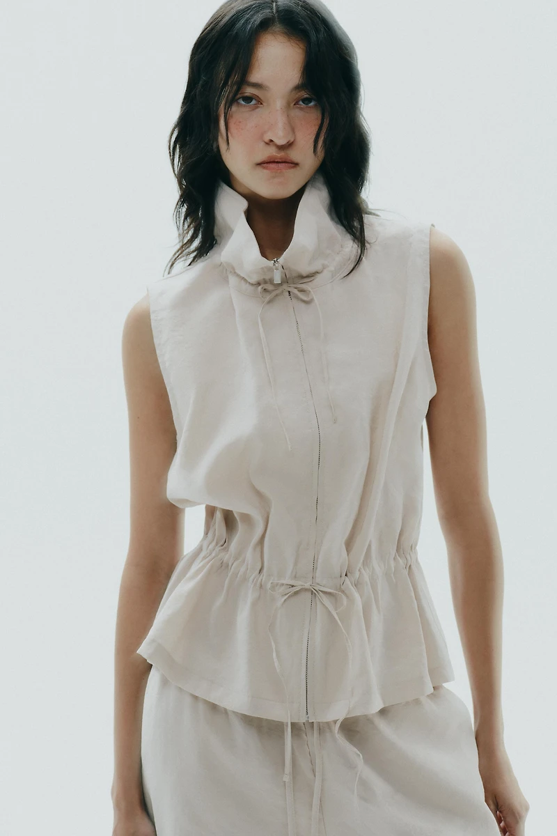 GILET FLUIDE AJUSTABLE