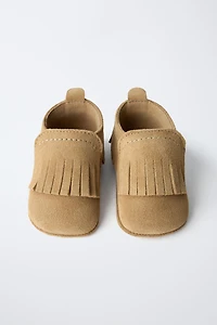 CHAUSSURES EN CUIR
