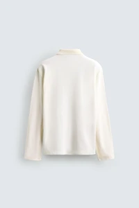 REGULAR FIT TEXTURED PIQUÉ POLO