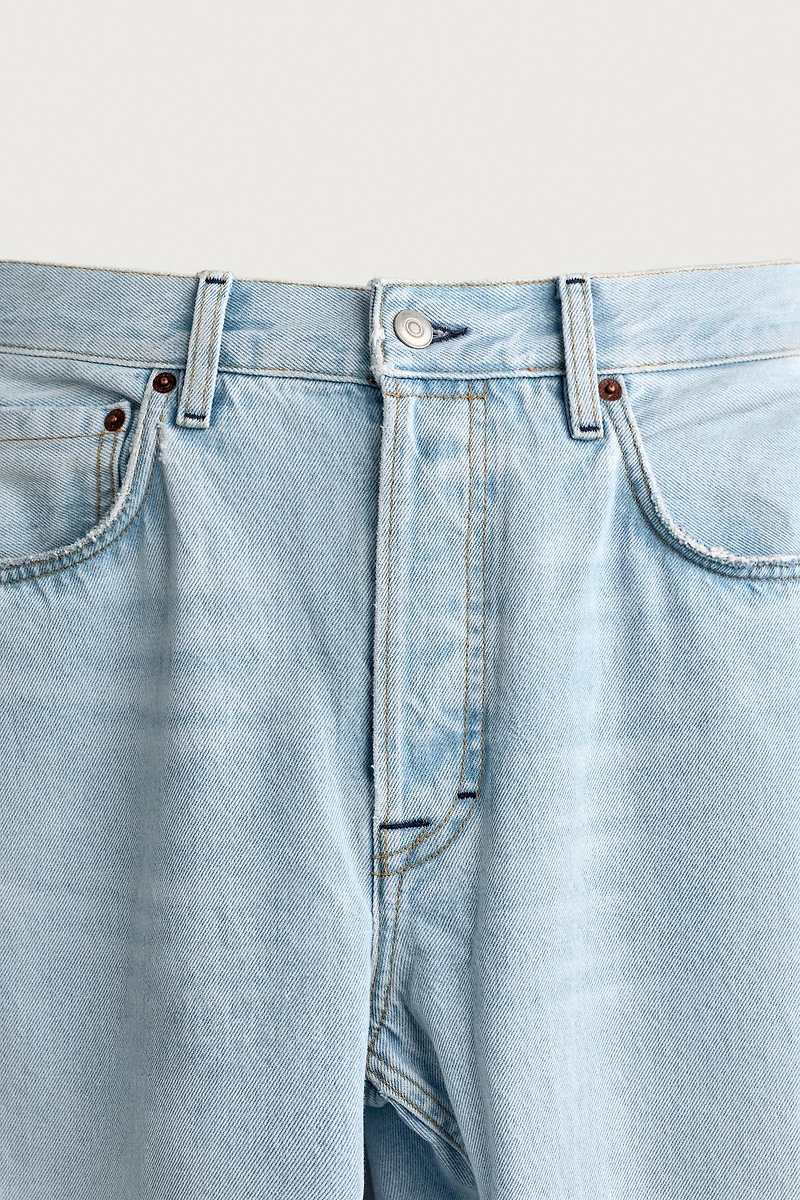 RIPPED BARREL FIT JEANS