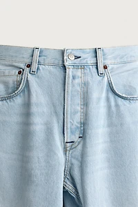 RIPPED BARREL FIT JEANS