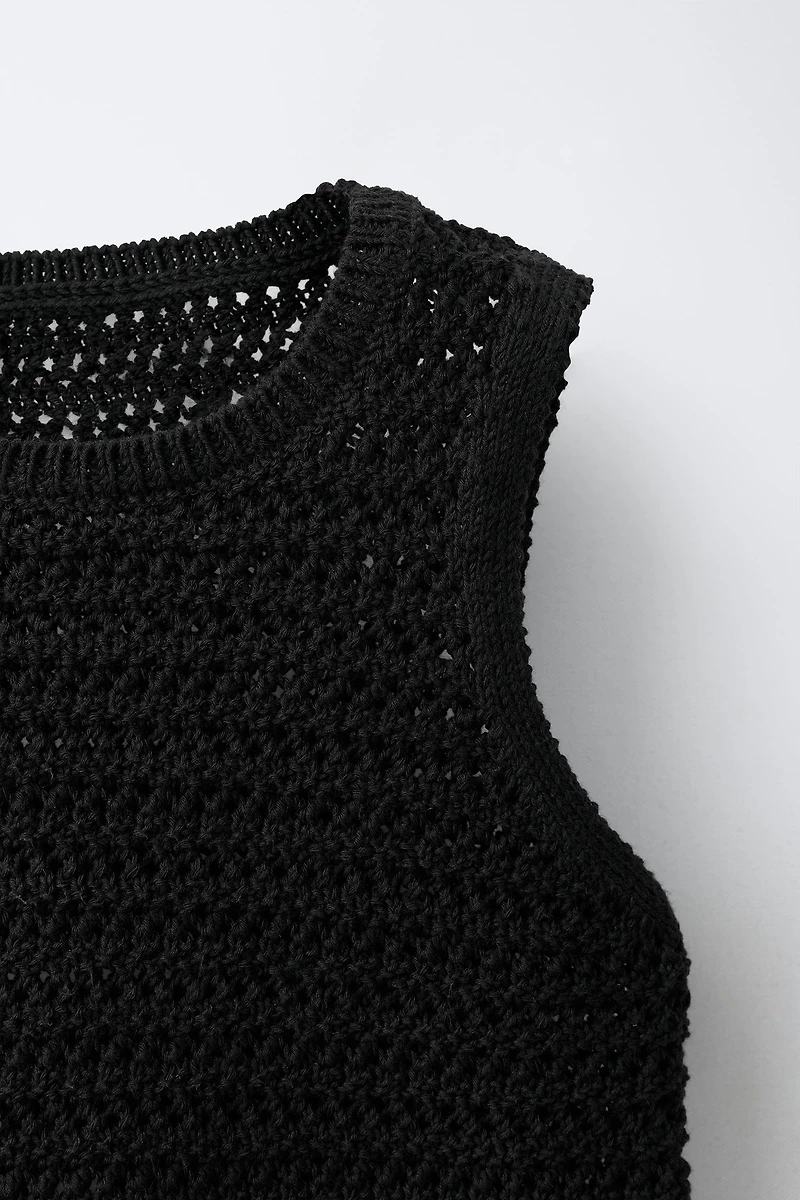 TOP EN MAILLE À FRANGES