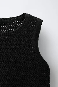 TOP EN MAILLE À FRANGES