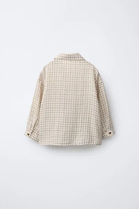 CHEMISE À CARREAUX ET POCHE