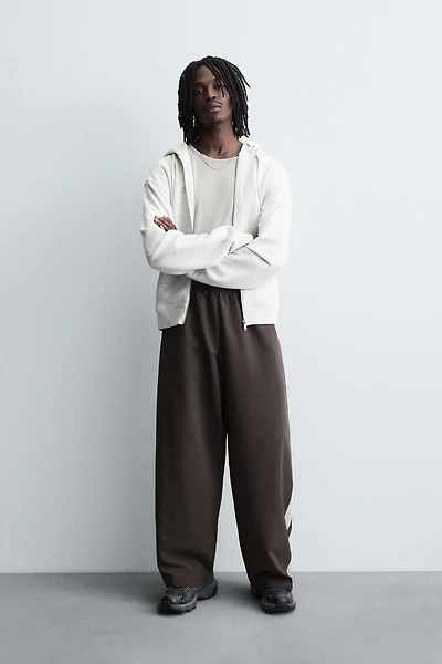 TECHNICAL PANTS WITH STRIPES