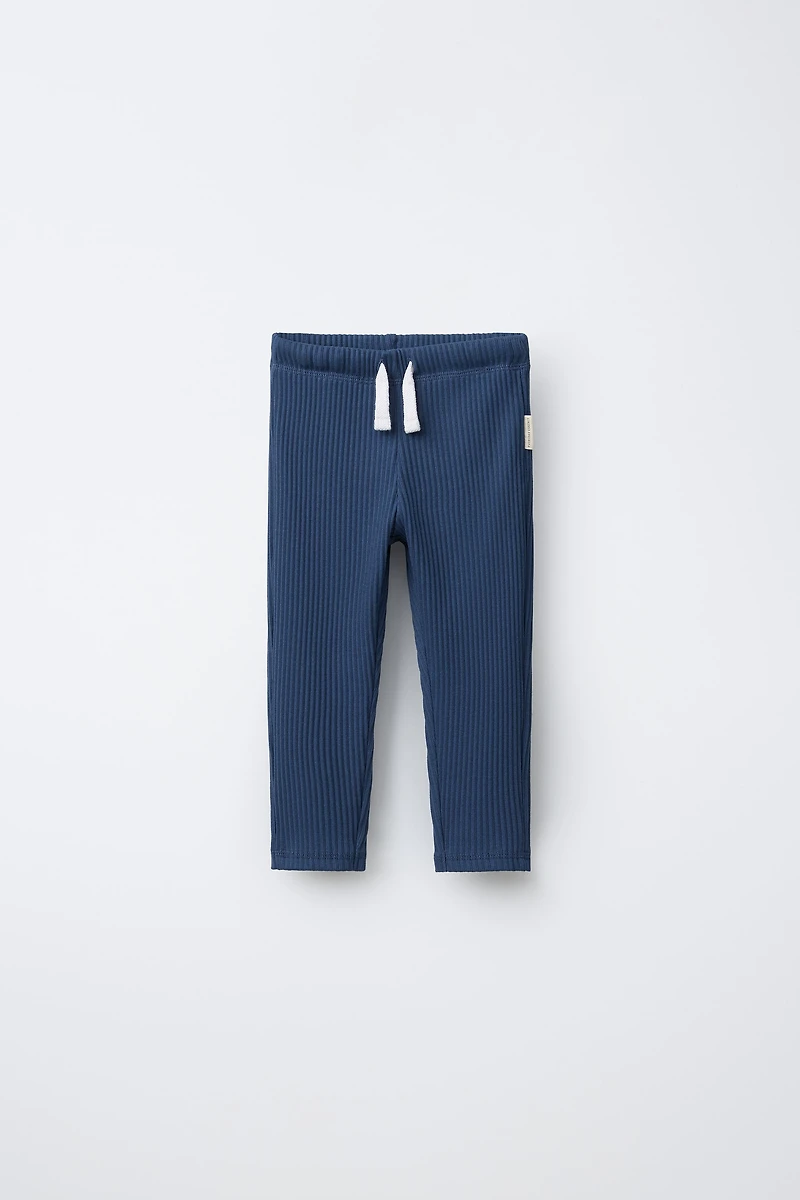 LEGGING LISSE À ÉTIQUETTE