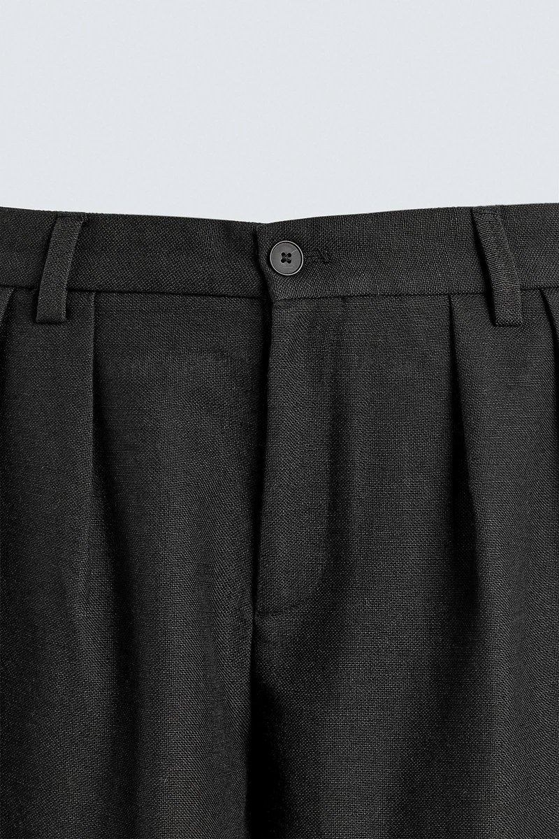 PLEATED RELAXED FIT PANTS