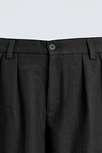 PLEATED RELAXED FIT PANTS