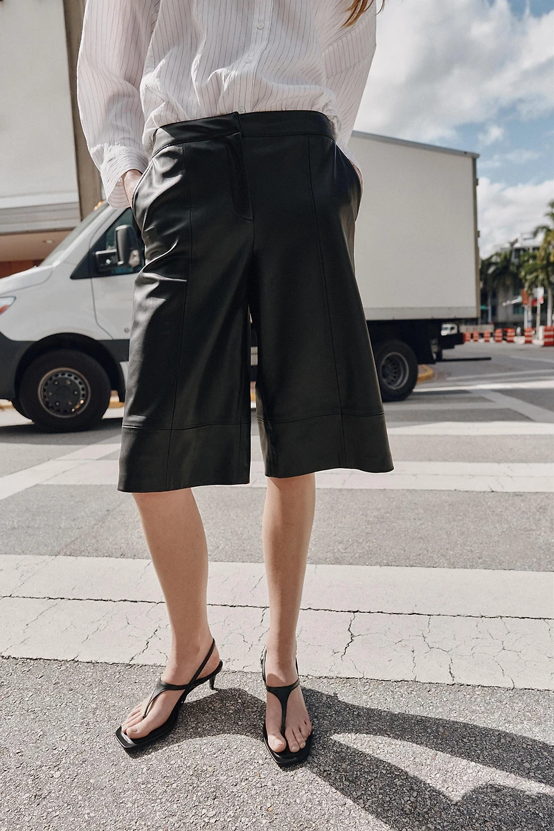 FAUX LEATHER LONG SHORTS