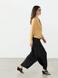 Flowing blouse with draped neckline