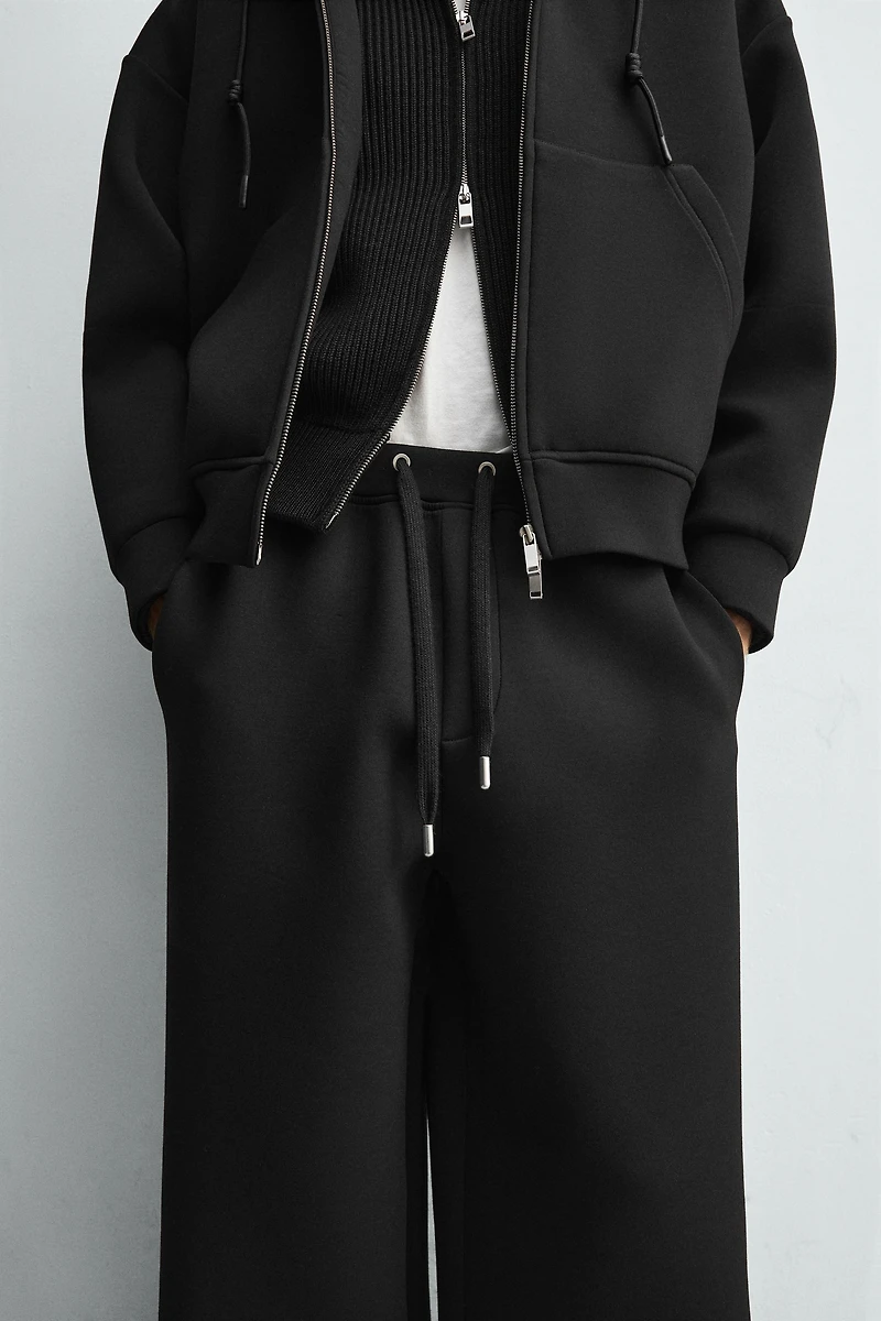 WIDE FIT NEOPRENE EFFECT PANTS