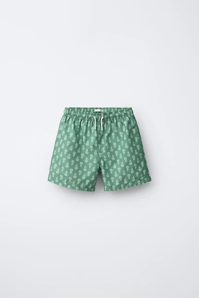 AGES 6-14 / PRINTED SWIM SHORTS