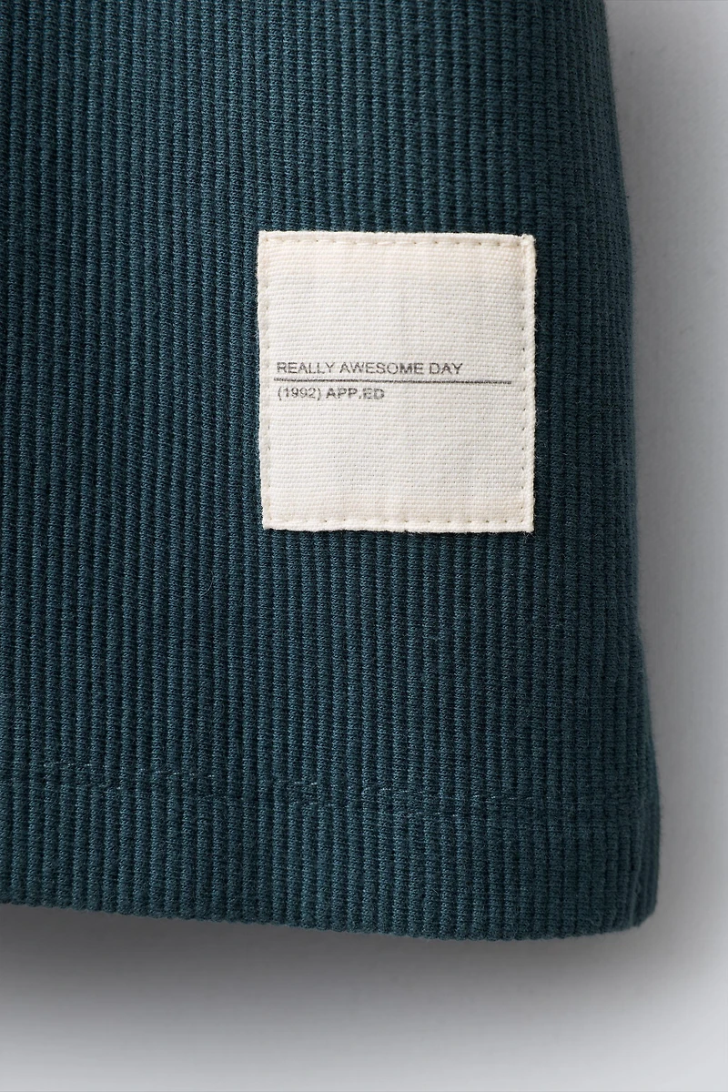 T-SHIRT AND BERMUDA OTTOMAN LABEL SET