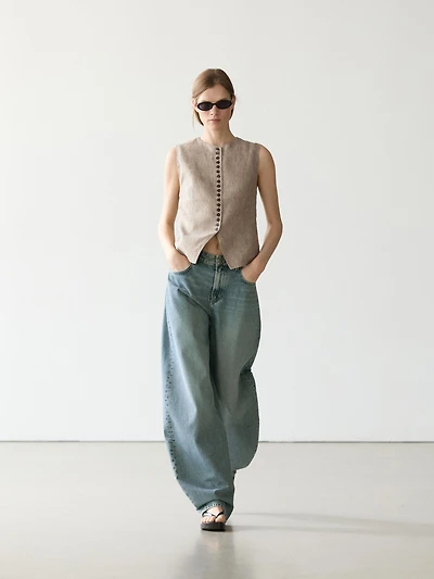Veste sans manches mélangée détails boutons lin