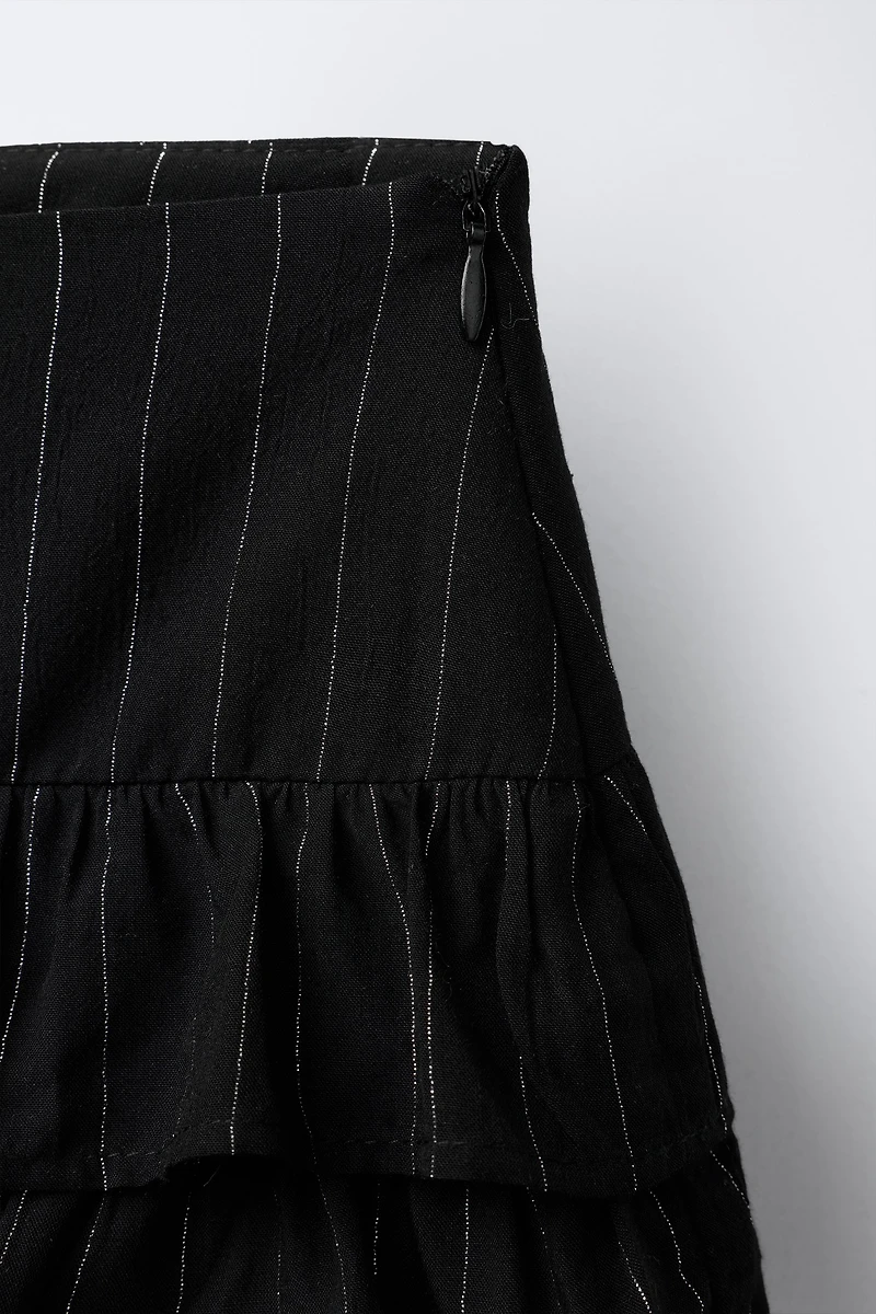 JUPE-SHORT À RAYURES BRILLANTES