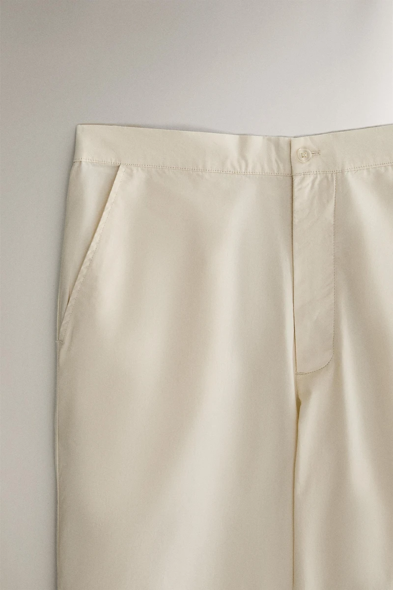PANTS WITH BLACK PIPING