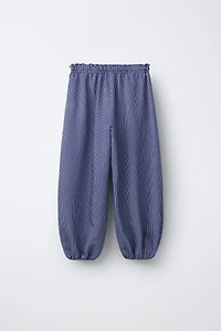 STRIPED PANTS WITH BOWS
