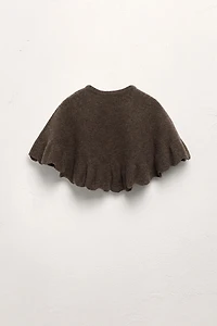 100% WOOL RUFFLED KNIT CAPE LIMITED EDITION