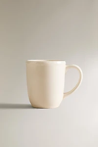 EARTHENWARE MUG WITH A RAISED-DESIGN EDGE