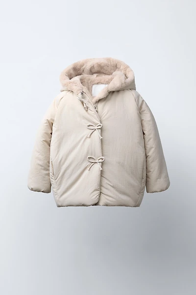 WATER REPELLENT PUFFER COAT WITH BOWS
