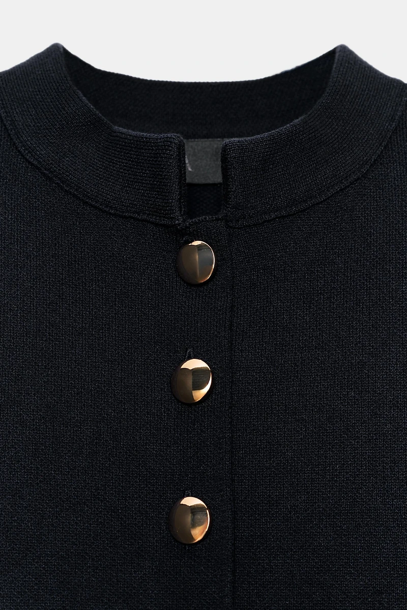 GOLD BUTTON PEPLUM CARDIGAN