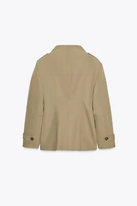 VESTE À POCHES ET PATTES