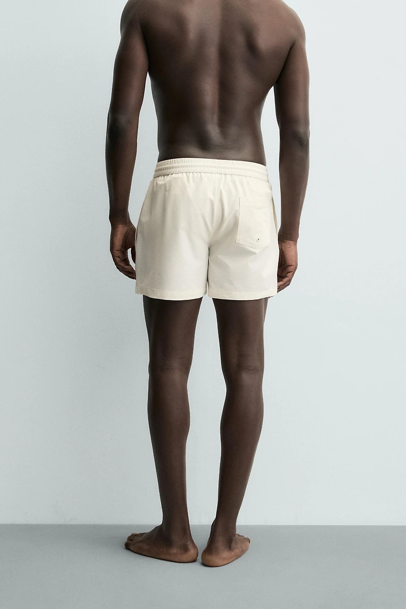 SEERSUCKER SWIM TRUNKS
