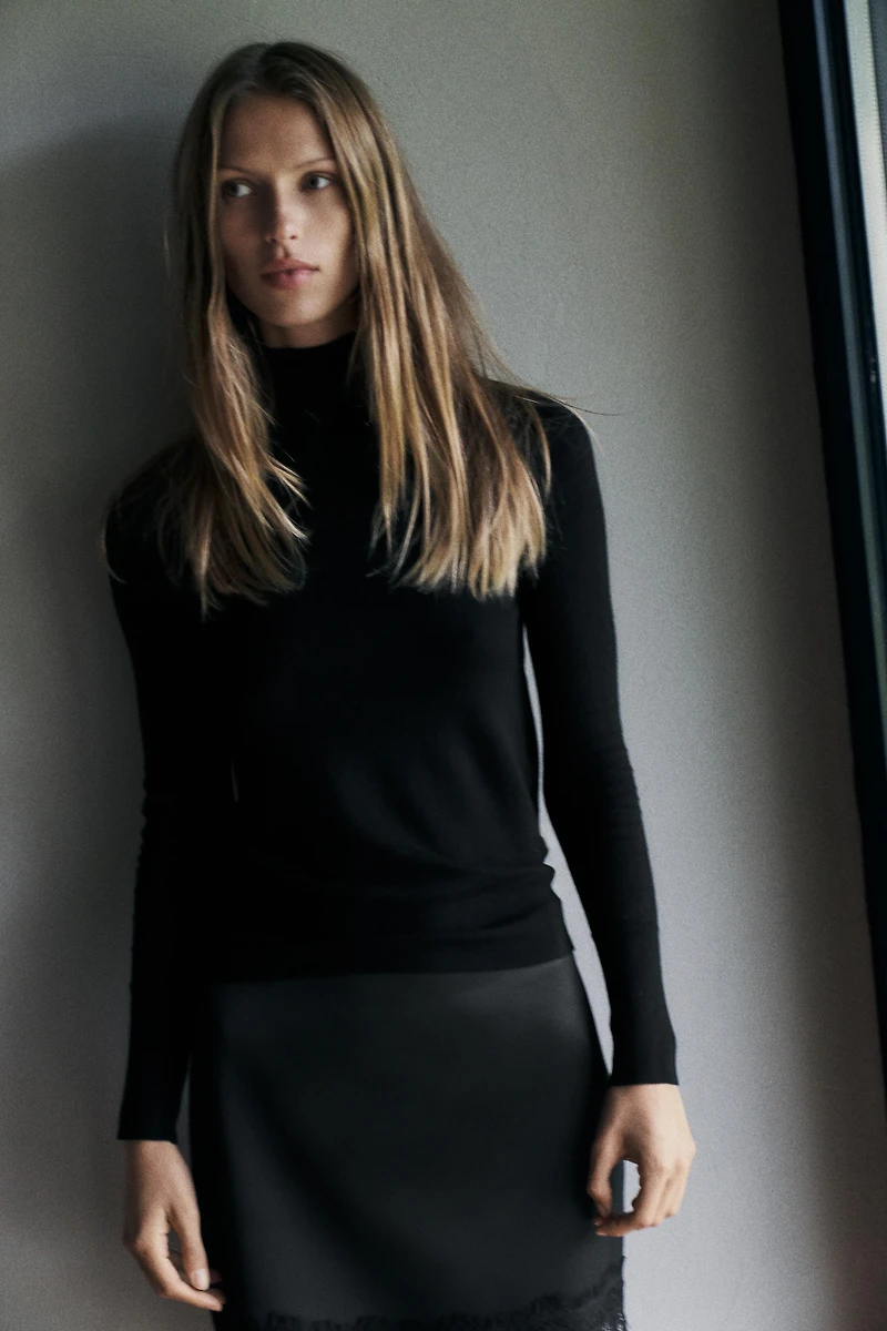 PULL EN MAILLE AVEC BOUTONS