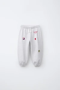 EMBROIDERED FLAG JOGGER PANTS