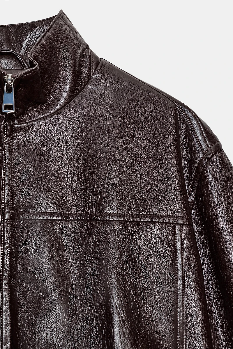 BOMBER COURTE MATIÈRE SYNTHÉTIQUE