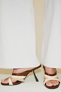 ASYMMETRIC HEELED SANDALS