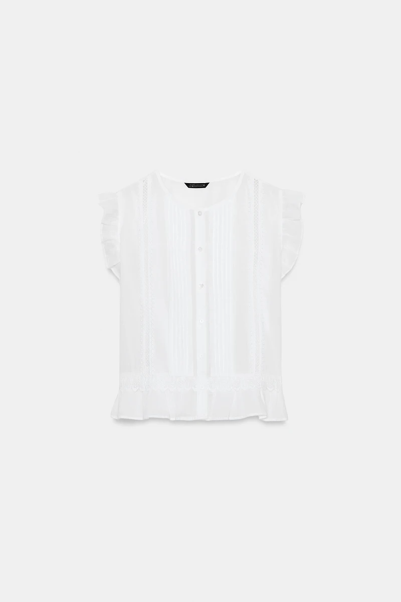 BLOUSE ENTRE-DEUX ET VOLANTS