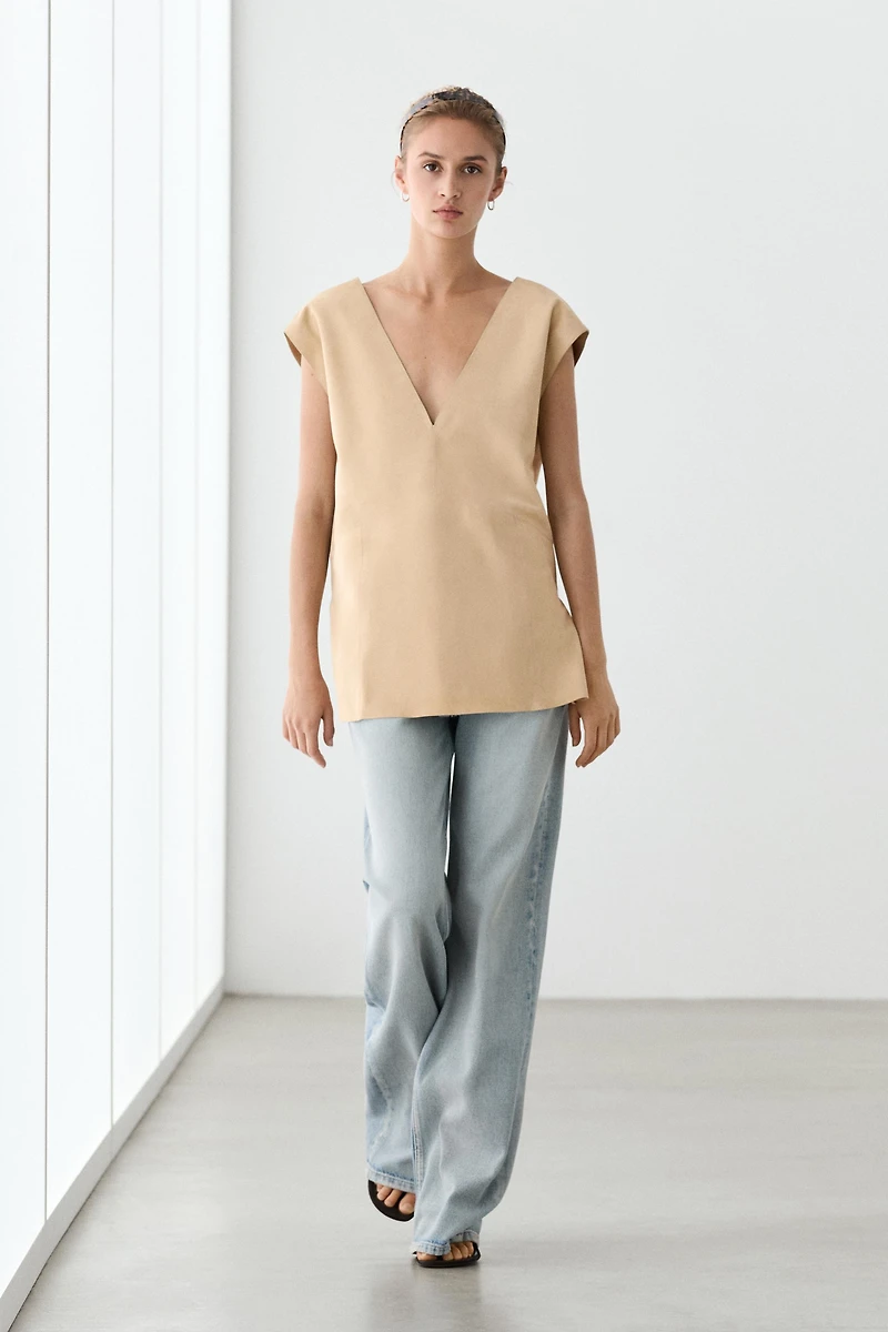 Top sans manches en cuir finition daim