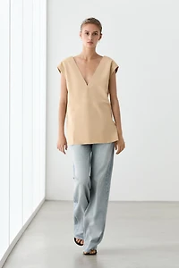 Top sans manches en cuir finition daim