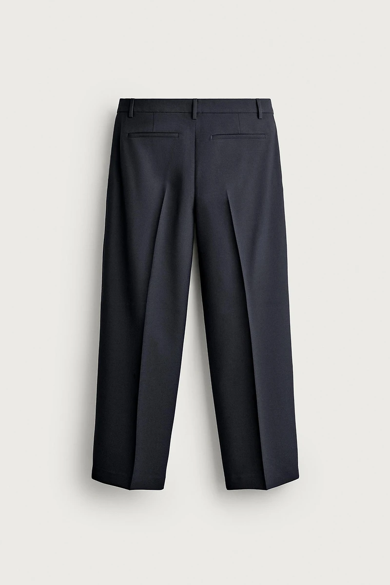 RELAXED FIT PLEATED PANTS