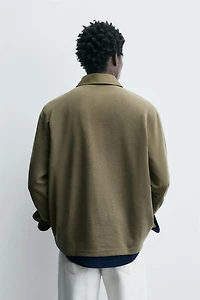 POLO DÉLAVÉ EN PIQUÉ STRUCTURÉ