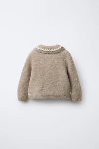 RUFFLE KNIT CARDIGAN