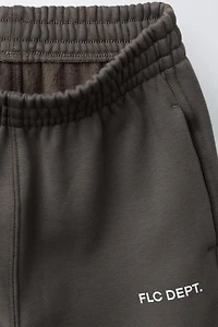 TEXT PRINT BALLOON PLUSH PANTS