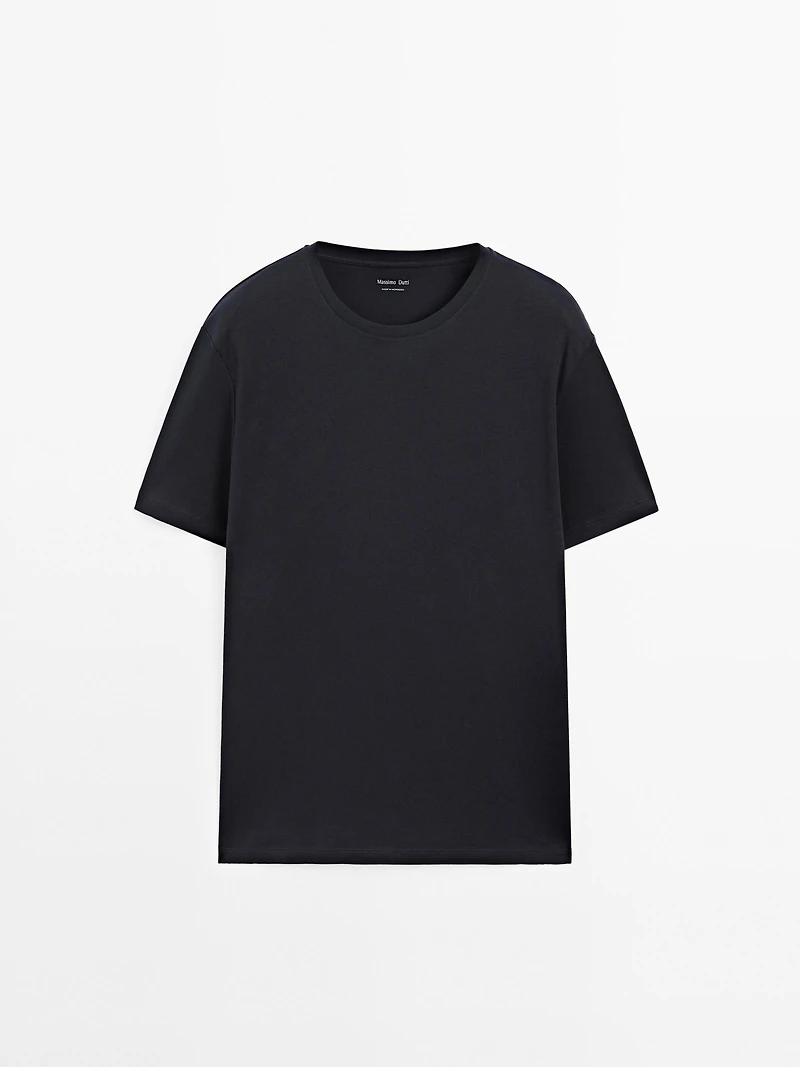 Short sleeve pyjama top and striped trousers