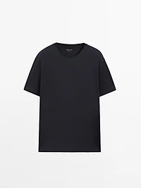 Short sleeve pyjama top and striped trousers