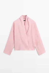 Flowing loose-fitting linen wrap blouse